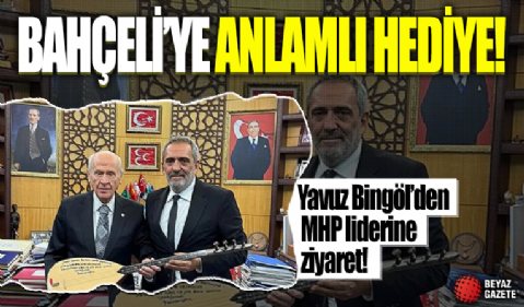 Sanatçı Yavuz Bingöl, Bahçeli'ye bağlama hediye etti! 'Alevi Bektaşiler olarak kendisine minnettarız'