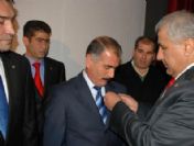 MHP 134 kişiye rozet taktı