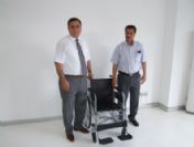 Tekerlekli Sandalyesine Kavuşuyor