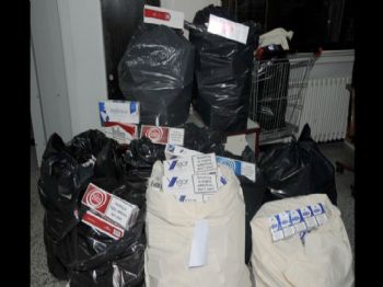 Örgüt evinden kaçak sigara çıktı