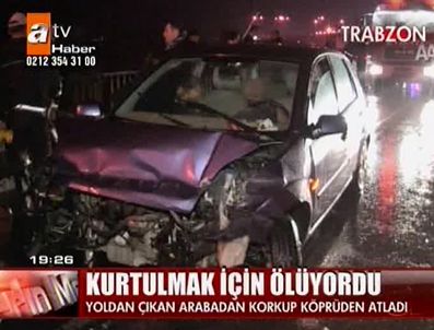 Arabanınn kendisine çarpacağını düşünüp köprüden atladı