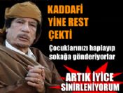 Kaddafi yine bildiğini okudu