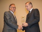 Başbakan Erdoğan`dan Güzelbey`e Ödül