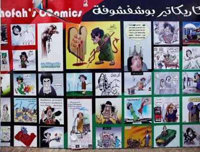 Libya'da duvarları Kaddafi'nin karikatürleri süslüyor