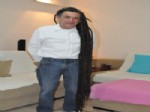 Boyundan Büyük Saçı Var