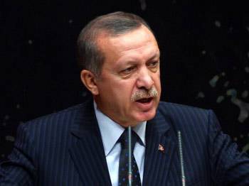 Başbakan Erdoğan: Eli silahlı canavar gibiler