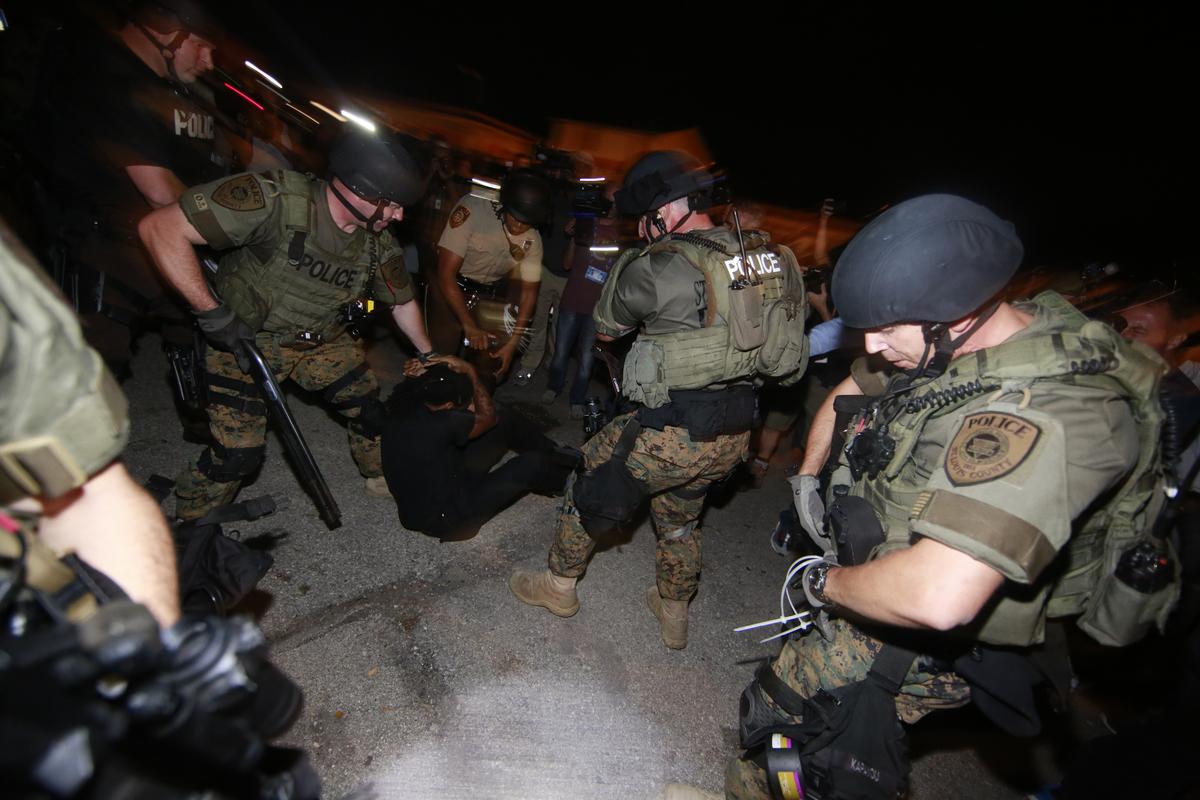 ABD polisi AA muhabirini kelepçe takarak gözaltına aldı