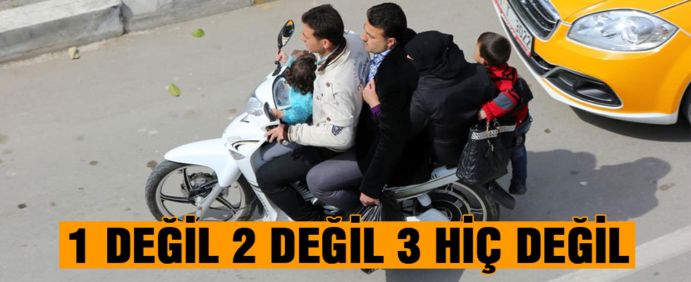 Motosiklette tehlikeli yolculuk