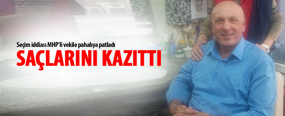 Milletvekili seçilen Ok saçlarını kazıttı