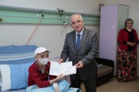 Tedavi Gören Öğrencilerin Karneleri Vali Tuna'dan