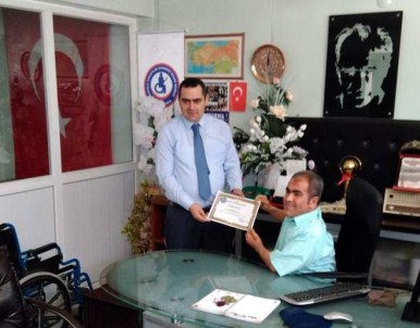 Kaymakamlıktan Anadolu Sakatlar Derneği Başkanına Şükran Belgesi