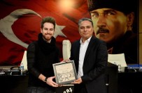 Uysal'dan Görkem Durmaz'a Anı Plaketi