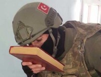 KUR'AN - Kur'an-ı Kerim'i öpüp, başına koydu