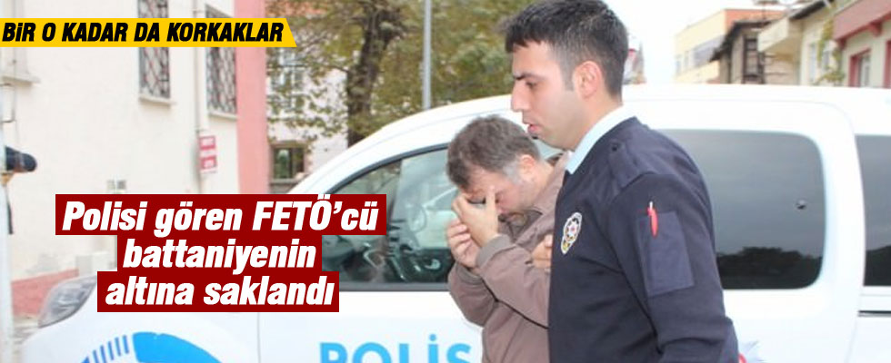 Polisi gören FETÖ'cü battaniyenin altına saklandı