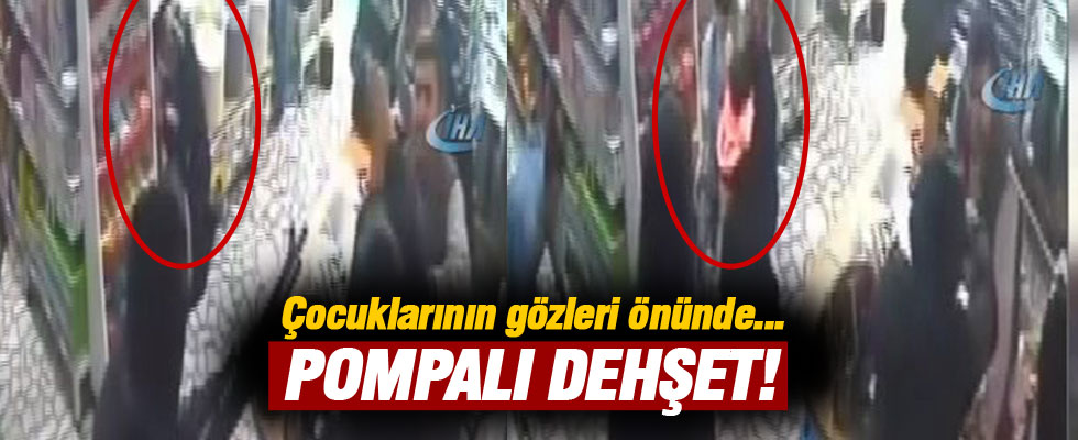 Marketteki silahlı soygunda korkulu gözlerle çocuklarına sarıldı