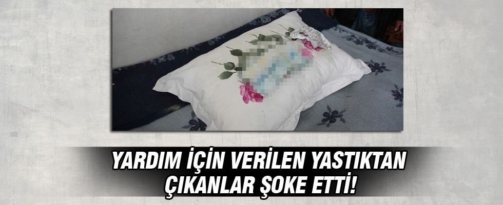 Yardım için verilen yastıktan para çıktı