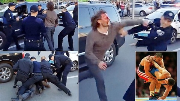 Ukraynalı eski güreşçiyi yedi polis tutamadı