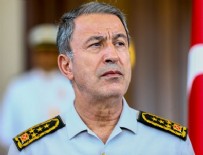 Darbeciler Hulusi Akar'ın başına silah dayamış