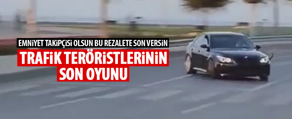 Trafik magandasından polise yakalanmamak için ilginç yöntem