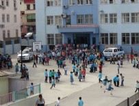 İLKOKUL ÖĞRENCİSİ - İlkokul öğrencisinin çantasında tabanca bulundu