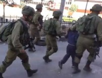 İsrail ordusu Filistin'de küçük çocukları gözaltına aldı