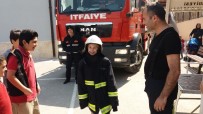 TURGAY CINER - Yangından Korkan Öğrencileri Kıyafetlerini Giydirerek Teselli Etti