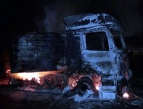 PKK’lı teröristler yol kesip araç yaktı