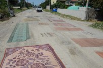 Mahalleliden Tozuyan Yola Halılı Çözüm