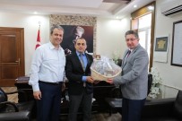 NTO Başkanı Arslan, Bozdoğan Kaymakamı Can'a 'Uzun Yaşam Sepeti' Hediye Etti