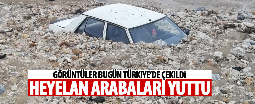 Heyelan otomobilleri yuttu