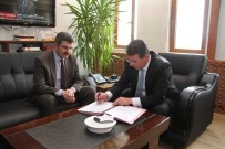 Erzimder İle Milli Eğitim Arasında