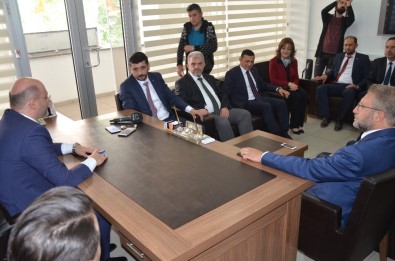 MHP'den AK Parti'ye Ziyaret