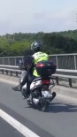 (Özel) Bacak Bacak Üstüne Atan Motosiklet Sürücüsünün Adeta Bir Kahvesi Eksik