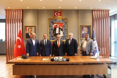 Dumlupınar Protokolü Başkan Alim Işık'ı Ziyaret Etti