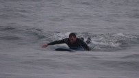 Sağanak Yağış Altında Sörf