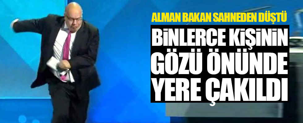 Alman Bakan Altmaier sahneden düştü burnu kırıldı