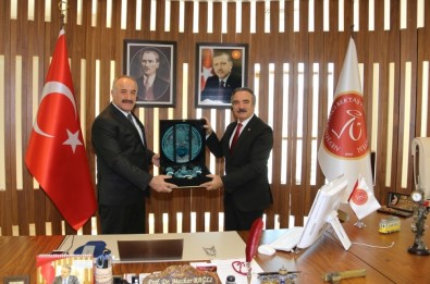 MGK Genel Sekreteri Hacımüftüoğlu'ndan Rektör Bağlı'ya Ziyaret