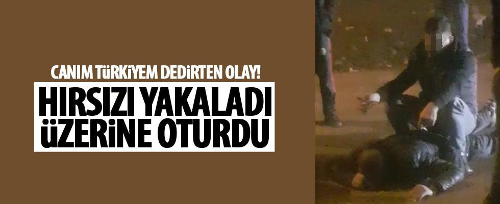 Hırsızı yakaladı, kaçmasın diye üzerine oturdu!