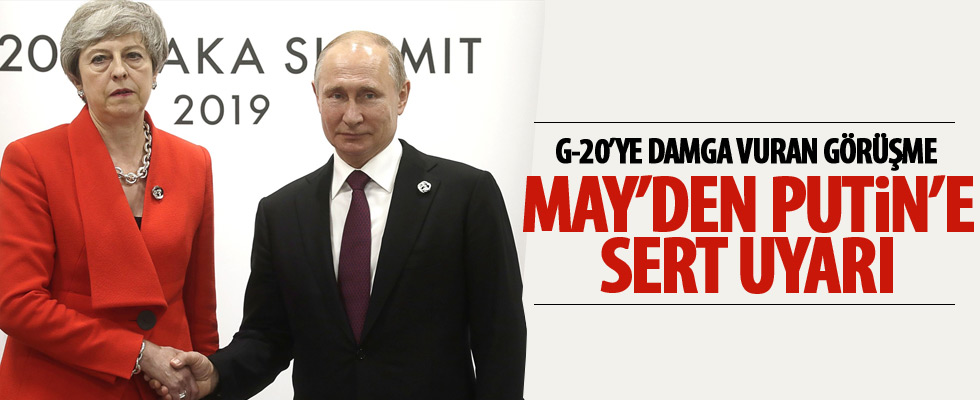 İngiltere Başbakanı May, Putin'i uyardı