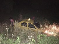 Manisa'da Lastiği Patlayan Taksi Tarlaya Yuvarlandı