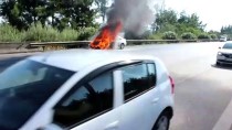 Adana'da Seyir Halindeki Otomobil Yandı