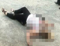 Genç kadına sokak ortasında kanlı infaz
