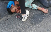 Otobüsün Altında Kalan Motosikletli Genç Ağır Yaralandı