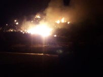 Kumluca'da Makilik Alanda Çıkan Yangın Seraları Tehdit Ediyor