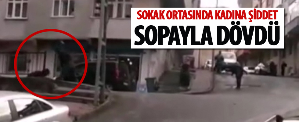 Sokak ortasında kadına sopayla şiddet uyguladı