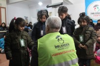 İmkander'den Suriyeli Yetimlere Mont Ve Ayakkabı Yardımı