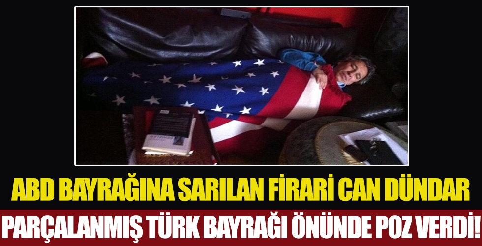 ABD bayrağına sarılıp yatan Can Dündar parçalanmış Türk bayrağı önünde poz verdi