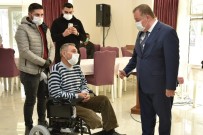 Engellilere Tekerlekli Sandalye İle Kıyafet Dağıtıldı