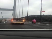 FATIH SULTAN MEHMET - Köprüden Geçen Motosikletli Kuryeye Sürücüler Kalkan Oldu