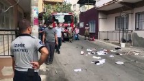 İzmir'de Yaktığı Kıyafetleri Ve Eşyalarını Pencereden Atan Kişi Gözaltına Alındı Haberi